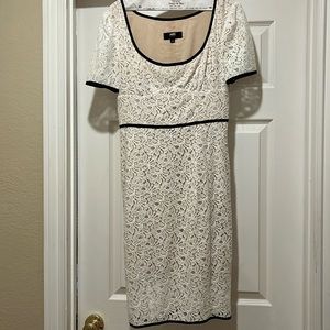 Like new ABS White lace dress with black trim, Size 6